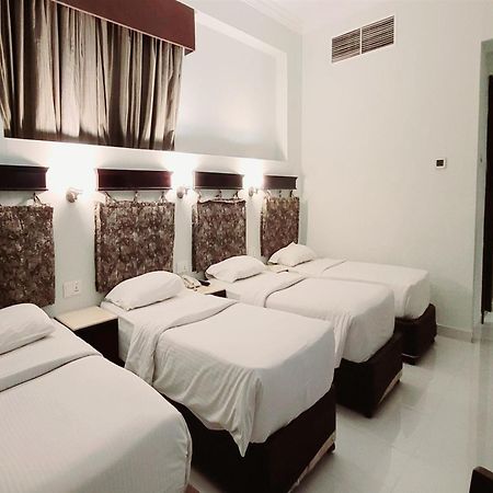 Signature Inn Hotel Deira دبي الغرفة الصورة