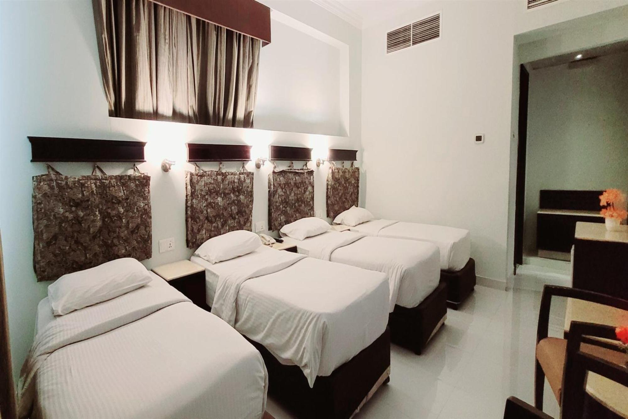 Signature Inn Hotel Deira دبي الغرفة الصورة